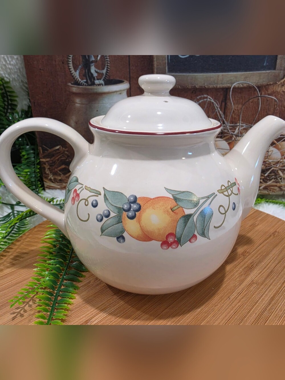 Corelle Cream Ceramic Teapot with Fruit and Green Leaf Motif and Red Trim